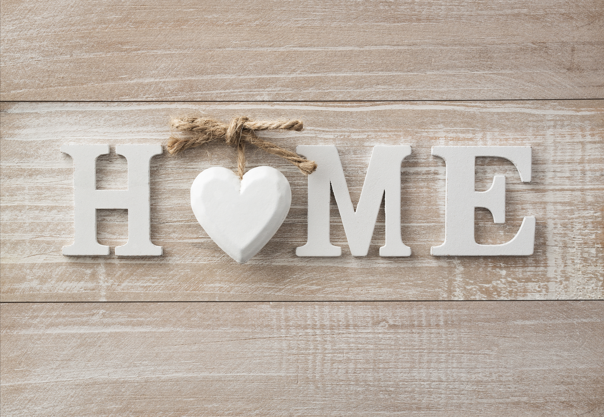 Home sweet home, wooden text on vintage board background with co from deposit photos